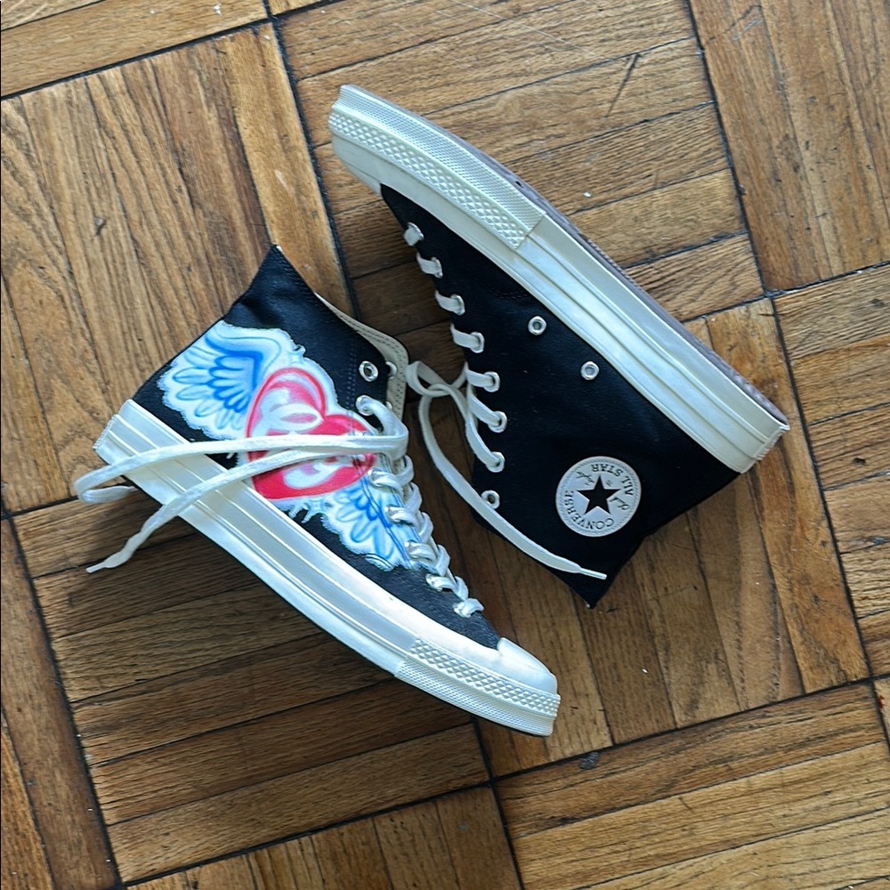 Converse Black High-Tops with Heart and Wing Design